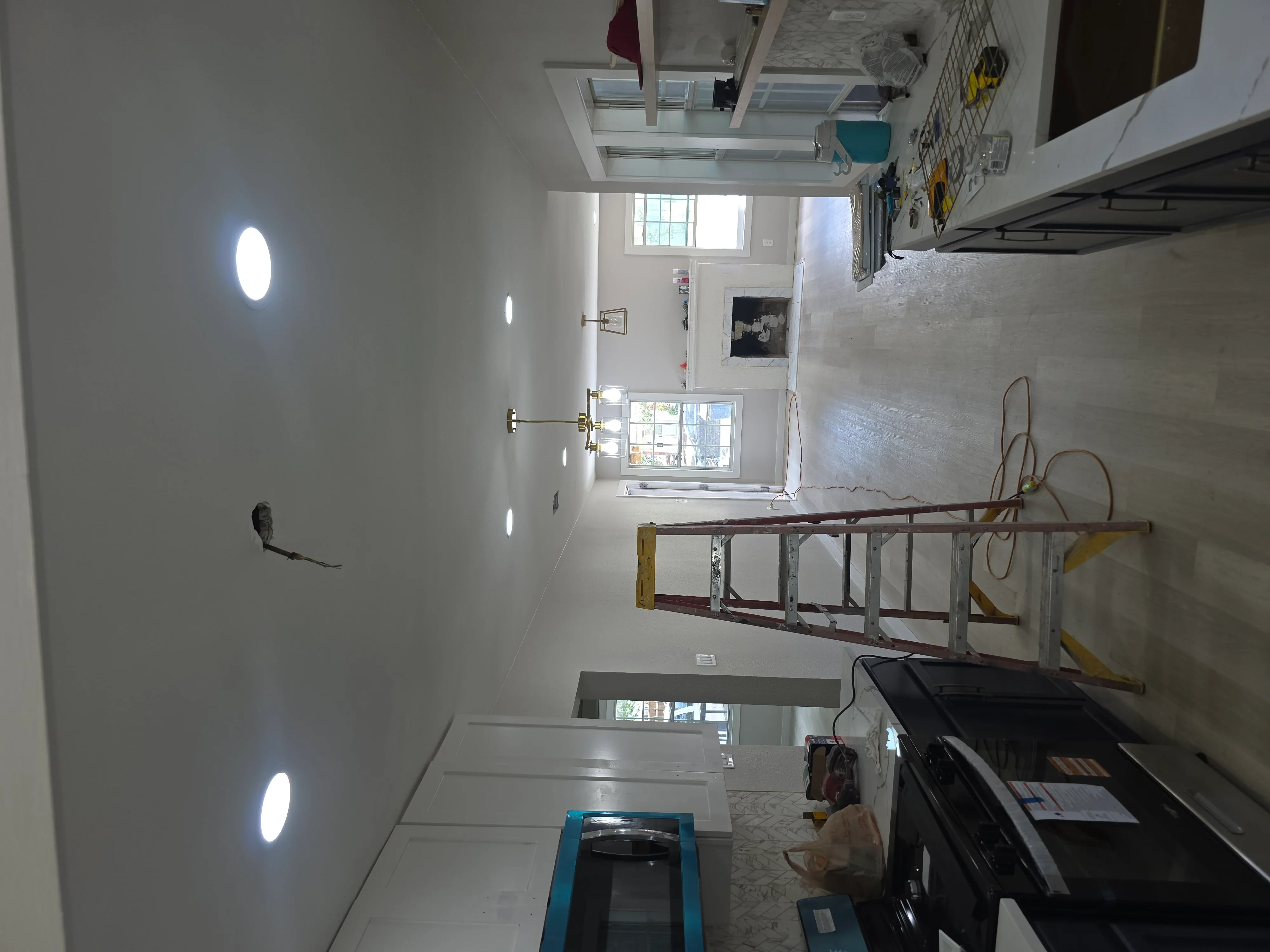 Drywall interior with recessed LED lighting and electrical outlet boxes installed