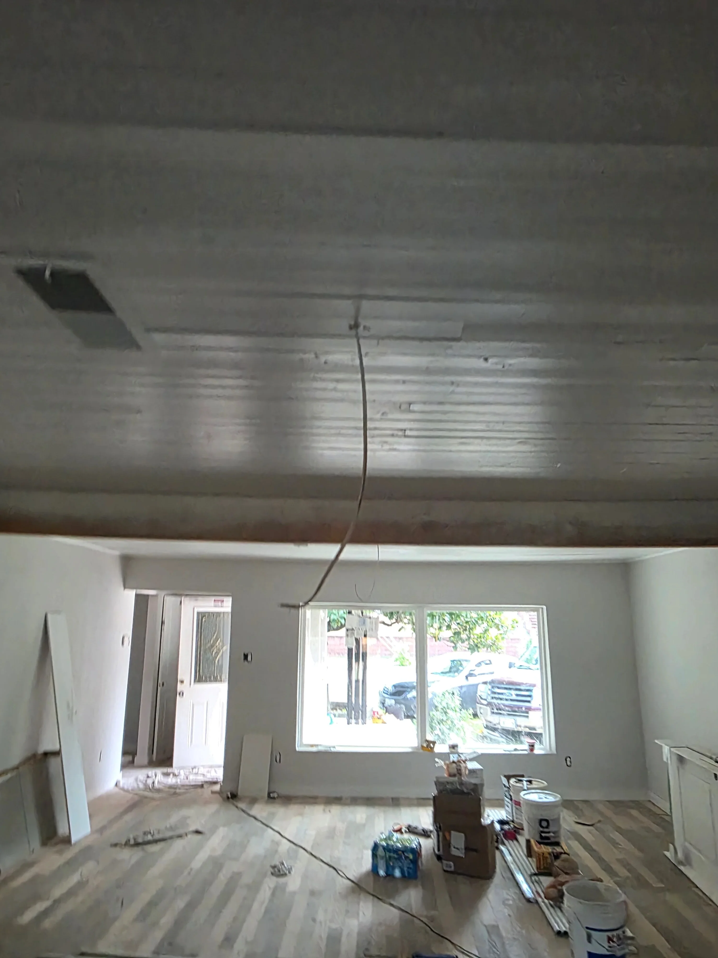 Recessed ceiling lights with electrical wiring installed in drywall ceiling